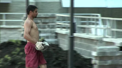 Working in the summer with a wheelbarrow Stock Footage 5072397