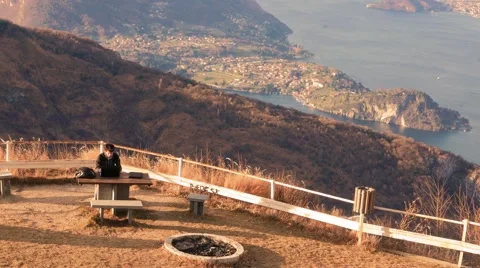 Working at sunset with the computer in a rest area overview Stock Footage 59524024