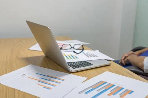 Working table with financial document reports Stock-Fotos