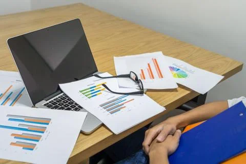 Working table with many financial document report Stock Photos