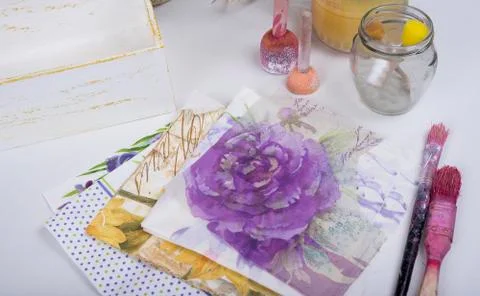 Working table with tools for decoupage like small sponges brushes and tissues Stock Photos