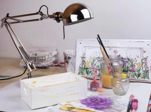 Working table with tools for decoupage like small sponges brushes and tissues Stock Photos