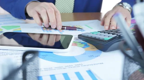 Working On Tablet And Graph Stock Footage 64057815