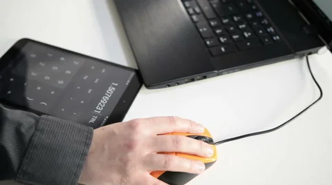 Working on Tablet and PC Stock Footage 49287053