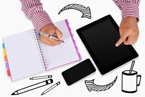 Working with tablet &amp; cell phone Stock Photos