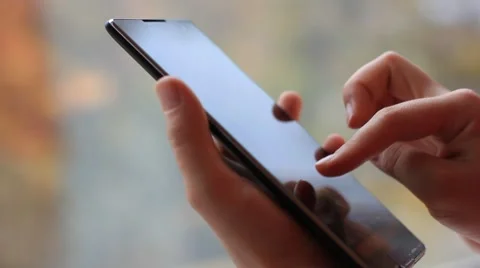 Working on tablet computer Stock Footage 64973448