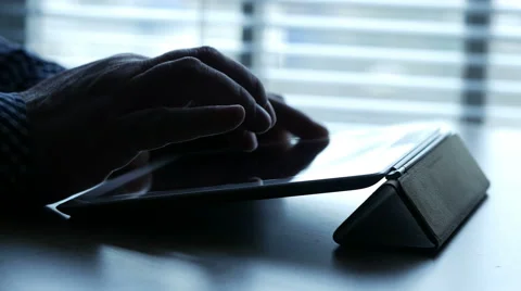 Working on tablet computer touchscreen, 4K, UHD Stock Footage 48785336