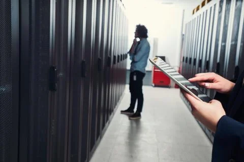 Working on tablet. server room Stock Photos