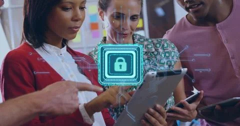 Working team of four tapping tablet and phone in office, showing lock graphic, Stock Photos