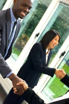 Working team shaking hands Stock Photos