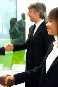 Working team shaking hands Stock Photos