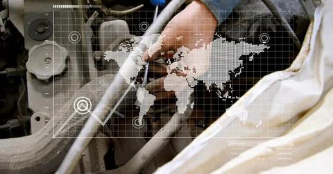 Working tech hands in dark long-sleeve shirt fixing engine at shop with dipstick Stock Photos