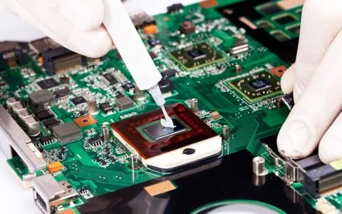 Working with thermal compaund Stock Photos