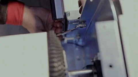Working to tighten the screws with a screwdriver Stock Footage