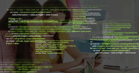 Working together at desk, two people with computer code animation overlay Stock Footage 303607934