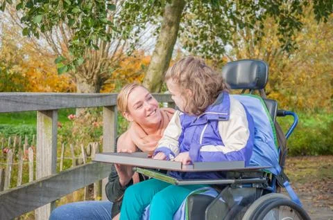 Working together with disability Stock Photos