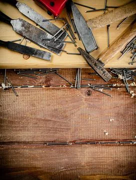 Working tool. Chisel, hammer and nails. Stock Photos