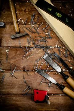 Working tool. Chisel, hammer and nails. Stock Photos