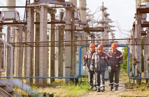 Working with a tool in the hands against the background of power Stock Photos
