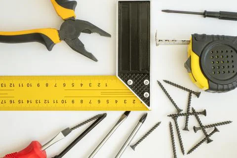 Working tool on a white background. Hardware store. Repair and construction. Stock Photos