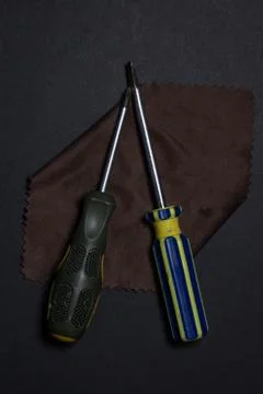 Working tools on a black background. Manual labor concept. Stock Photos