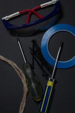 Working tools on a black background. Stock Photos