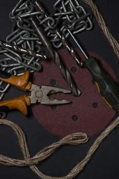 Working tools on a black background. Stock Photos