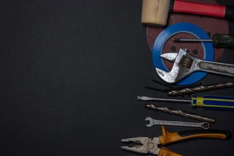 Working tools on a black background. Stock Photos