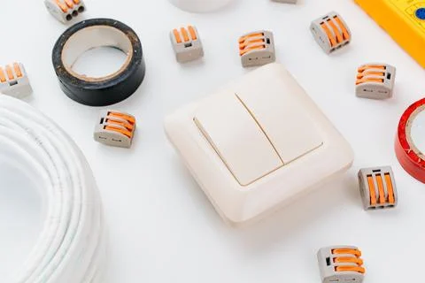Working tools for an electrician on a white background. Stock Photos
