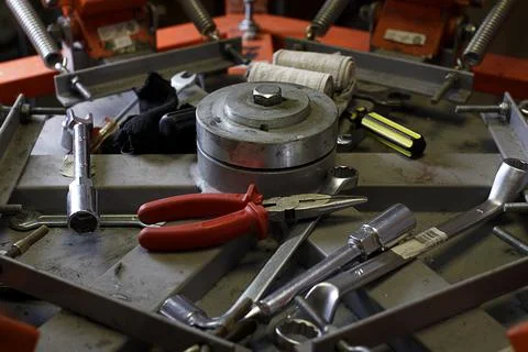 Working tools in the middle of print screening apparatus. Stock-Fotos