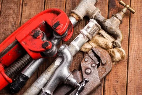Working tools, plumbing, pipes and faucets Stock Photos
