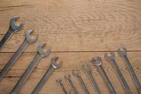 Working tools on a wooden rustic background. Top view with an empty place for Stock-Fotos
