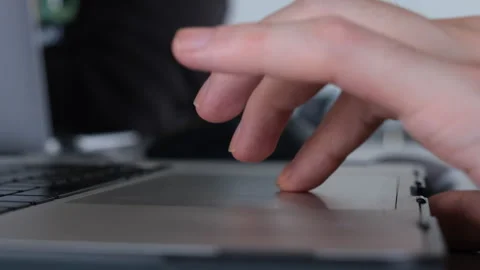 Working with the trackpad of Macbook Pro, Close up Stock Footage 259212907