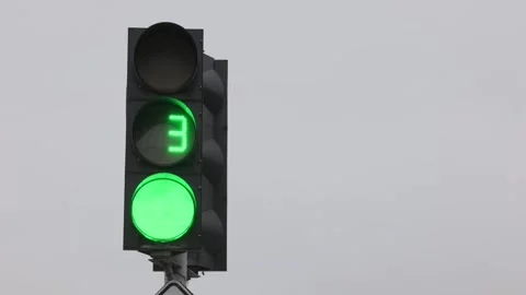 Working traffic light with countdown against the sky. Stock Footage 300711095