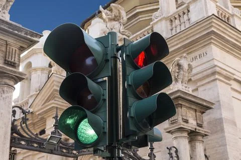 A working traffic light at a street intersection in the city Stock Photos