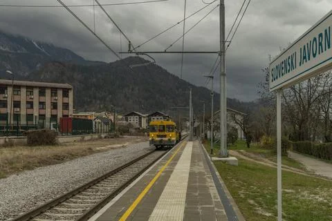 Working train in station in cloudy spring day in Slovenski Javornik 03 31 202 Stock Photos