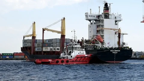 Working tug in harbor Stock Footage 90886017