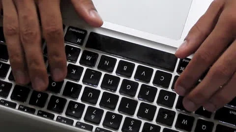 Working under stress. Typing on a laptop keyboard Stock Footage 24465976