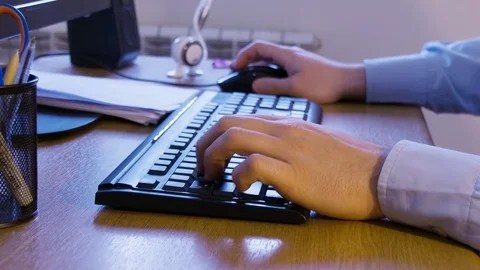 Working Useing Keyboard on Workdesk Stock Footage 71381384