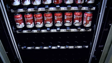 Working Vending Machine Delivering Coca Cola Can Stock Footage 67461456