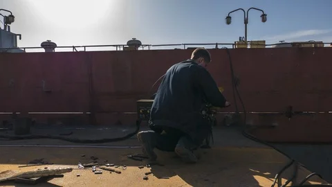 Working on the vessel with a welding device, welds seams on the body Video stock 86255243