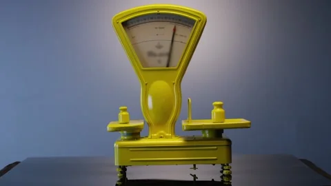 Working Vintage Scale With Arrow . The Weigher Are Unsteady Until They Balance . Stock Footage 132524062