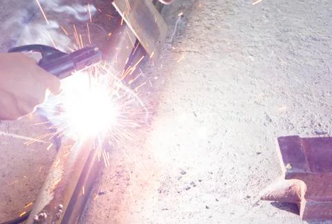 Working with a welding machine Stock Photos