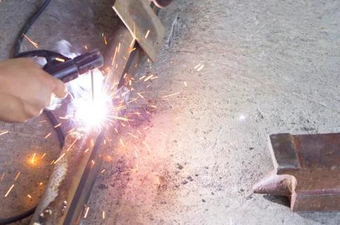 Working with a welding machine Stock Photos