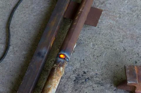 Working with a welding machine. Stock Photos