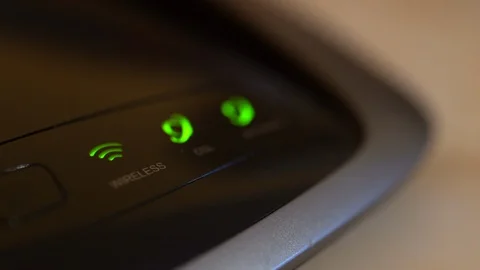 Working Wi-Fi router, blinking green indicators, wireless connection Video stock 120205202