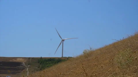Working windmill in the fields of Georgia, Energy Production - Clean and Video stock 94134650