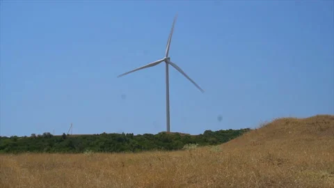 Working windmill in the fields of Georgia, Energy Production - Clean and Stock-Footage 94134692