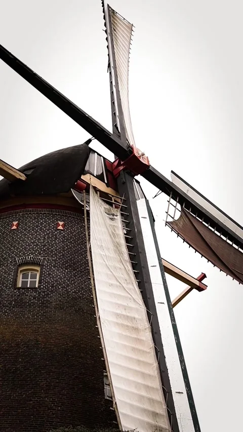 Working windmill in the Netherlands that still use for grinding wheat Stock Footage 292453351