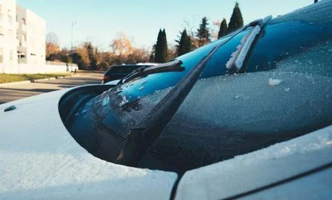 Working Windshield Wipers Of The Car Clean The Snow Stock Photos
